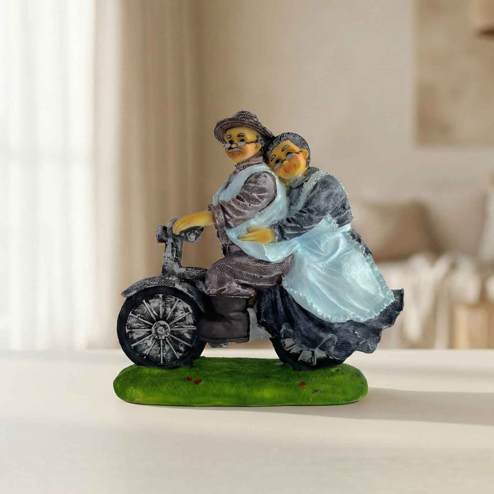 Made with LogoLicious Add Your Logo App TCG 8.2" Dada Dadi Statue Riding Bike - Image 1